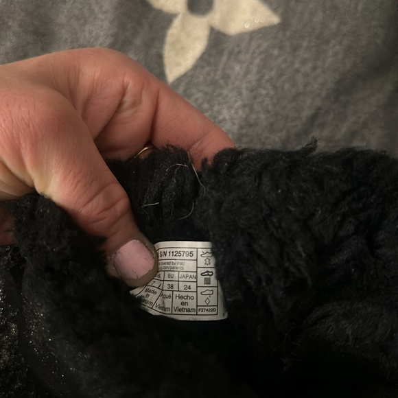 UGGs for sale. Women’s size 7. They are black with gold and a bow on the back. - Picture 4 of 6